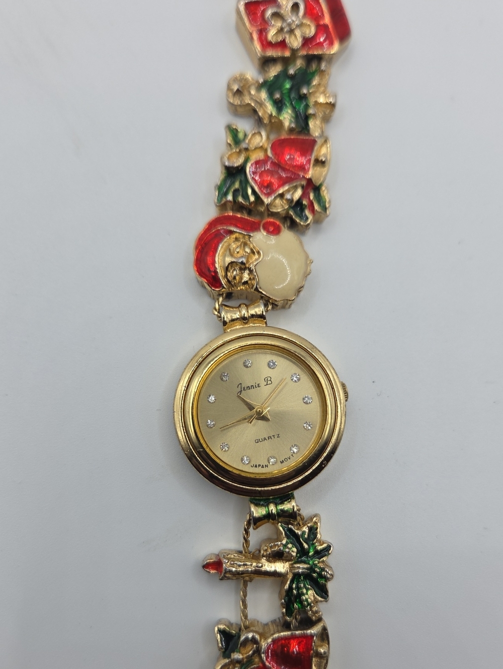 Jenni Gold Tone Watch Bracelet with Red and Green Enamel Accents